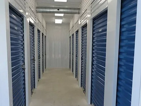Row of drive-up storage units inside the corridor at AAA Stock 'n Lock